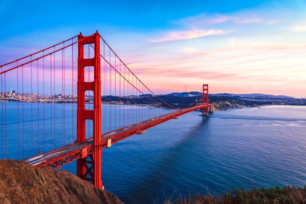 Golden Gate Bridge on sunset sky San Francisco California